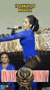 a woman in a blue dress is singing into a microphone with the words to ganjel to wuaseek on the bottom