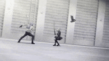 a man with a sword is running towards another man with a sword