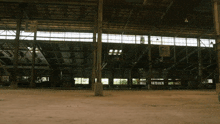 an empty warehouse with a sign that says ' a.i. ' on it