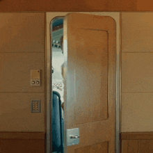 a man standing in a doorway with the words " is this supposed to be here "