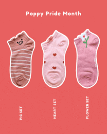 three pairs of pink socks with the words poppy pride month