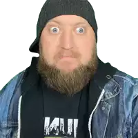 a man with a beard is wearing a black shirt that says " mu "