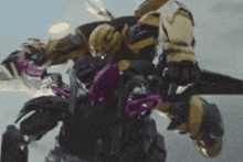 a robot is flying through the air with a purple object in its mouth