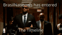 Lebron James Entrance GIF - Lebron James Entrance Suit And Tie GIFs