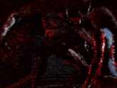 a woman is laying on the ground with blood coming out of her face