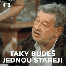 a man with the words taky budes jednou starej on the bottom