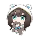 a little girl is holding a teddy bear in her hands .