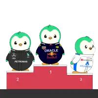 three penguins on a podium with one wearing an oracle red bull jersey