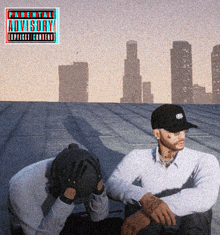 two men are sitting on a roof with an advisory sticker on the top