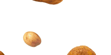 a bunch of potatoes on a white surface