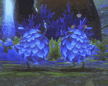 two blue birds are standing next to each other in front of purple plants