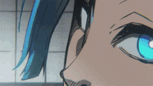 a close up of a person with blue hair