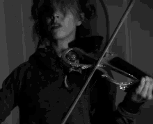 lindsey stirling woah playing violin violin playing black and white