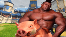 a very muscular man is riding a pig with a crown on its head