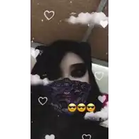 a woman wearing a bandana and sunglasses is taking a selfie .
