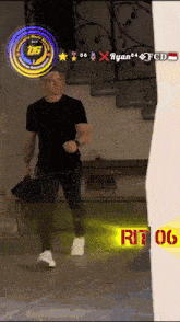 a man in a black shirt is standing in front of a sign that says ryan fcd