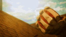 a giant fist is reaching out towards the sky