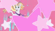 two ponies are playing in a pool with a flamingo float and a beach ball