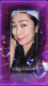 a woman 's face is displayed on a purple background