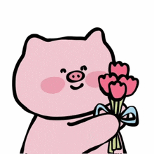 a pink pig is holding a bouquet of flowers .