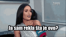 a woman sitting in front of a microphone with the words ja sam reka sta je ovo