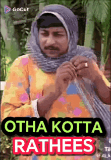 a cartoon of a man wearing a hijab and a scarf with the words otha kotta rathees on it