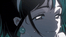 a close up of a cartoon character 's face with a tear coming out of her eye .