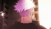 a person with purple hair and a black shirt