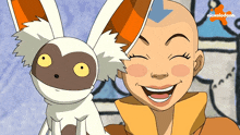 a cartoon character from nickelodeon is smiling next to a small animal