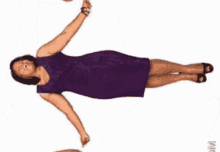 a purple shirt is being worn by a person