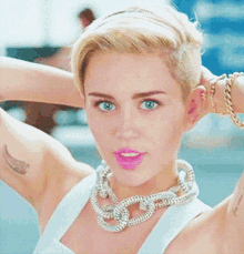 Wink How You Doing GIF - Wink How You Doing Miley Cyrus GIFs