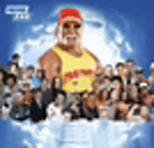 a blurry picture of a man in a yellow tank top standing in front of a crowd .