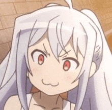a close up of a cartoon girl with white hair and red eyes making a face .
