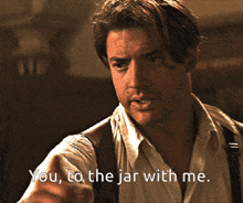 a close up of a man with the words you to the jar with me below him