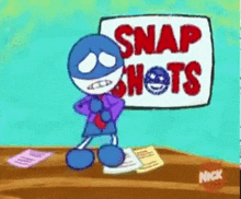 a cartoon character is standing in front of a sign that says snap nets