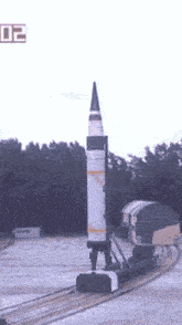 a rocket with the number 02 on the bottom right