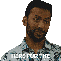 a man with a beard and a floral shirt says here for the