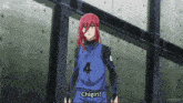 a girl with red hair and the number 4 on her jersey