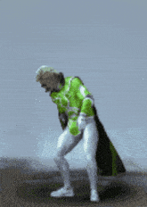 a man in a green superhero costume is dancing