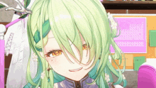 a girl with green hair is smiling in front of a calendar