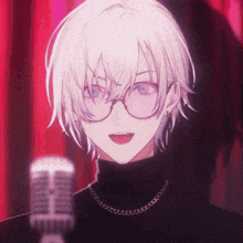 a boy with glasses and a black turtleneck is singing into a microphone