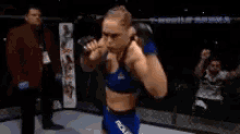 fighter punch mma rhonda rousey cage match