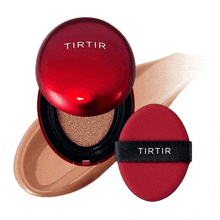 a red cushion with the word tirtir on it is sitting on top of a white surface .