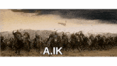 a large group of soldiers are riding horses and the letters a.i.k are visible