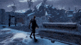 a man with a sword and shield is walking in the snow