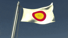 a white flag with a red circle with a yellow chrysanthemum in the middle