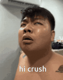 a shirtless man with his eyes closed and the words hi crush on his chest