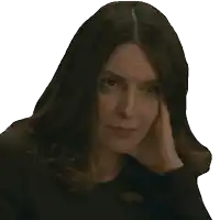 a woman making a sad face with her hand on her face