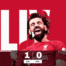 a man with a beard is wearing a red shirt with the word liv on it