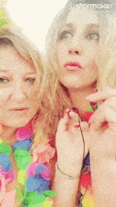 two women standing next to each other with a starmaker logo on the bottom right